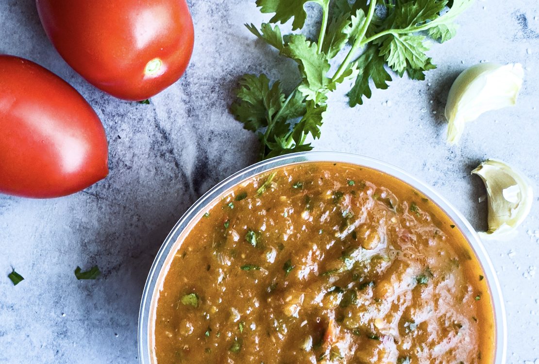 Vegan Tangy 'n' Smoky Chipotle Lime Salsa in bowl with veggies