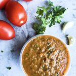 Vegan Tangy 'n' Smoky Chipotle Lime Salsa in bowl with veggies