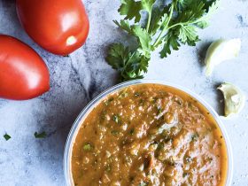 Vegan Tangy 'n' Smoky Chipotle Lime Salsa in bowl with veggies