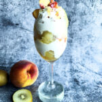 Creamy 'n' Tangy Kiwi-Peach Summer Parfait in glass (front)