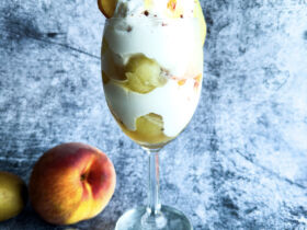 Creamy 'n' Tangy Kiwi-Peach Summer Parfait in glass (front)